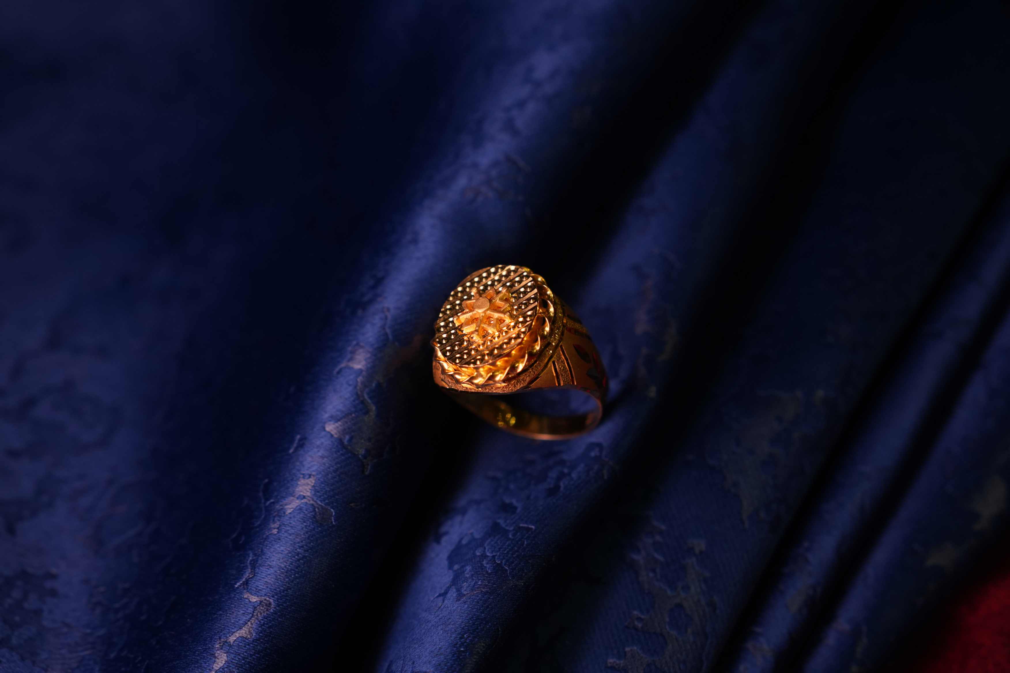 Traditional antique gold necklace with intricate embossing